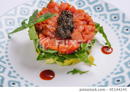 Salmon tartar with capers on plate Salmon tartar with capers on plate 95144245
