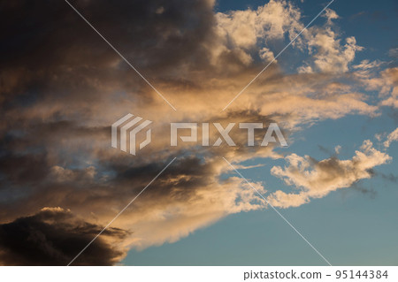 sunset sky and dark clouds 95144384