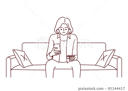 Young woman sit on sofa buy online with credit card Young woman sit on sofa buy online with credit card 95144417