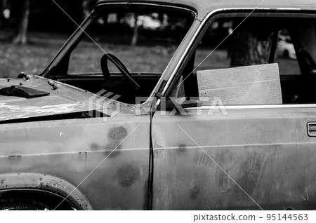 black abandoned automobile black abandoned automobile 95144563