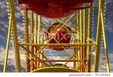 Attraction (carousel) ferris wheel against the background of a romantic evening sky 95144958