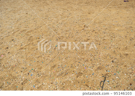 Microplastics on Sand Beach 95146103