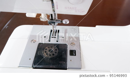 start a sewing machine start a sewing machine 95146993
