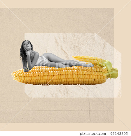 Slim girl lying on huge ear of corn. Contemporary art collage. Healthy eating for bodies beauty. Body care, eco products, vitamins concept. Slim girl lying on huge ear of corn. Contemporary art collage. Healthy eating for bodies beauty. Body care, eco products, vitamins concept. 95148805