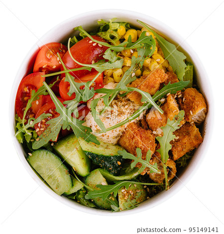 Salad with fried chicken nuggets and vegetables Salad with fried chicken nuggets and vegetables 95149141