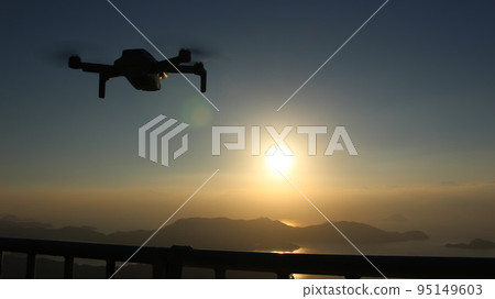 Drone in flight! The sky blue of twilight The brilliance of the SDGs earth Drone in flight! The sky blue of twilight The brilliance of the SDGs earth 95149603