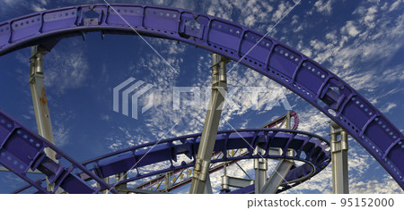 Attraction roller-coaster (switchback) on the background of the cloudy sky Attraction roller-coaster (switchback) on the background of the cloudy sky 95152000