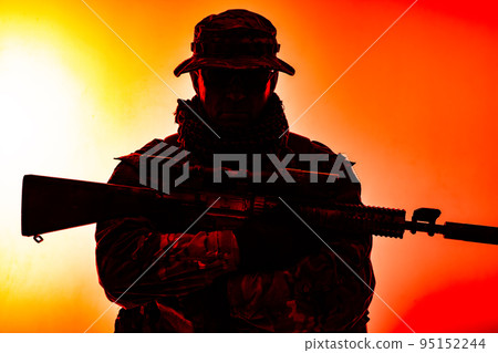 Army special forces soldier, commando shooter, mercenary in camouflage uniform, bonnie, hidden behind mask and glasses face, armed service rifle, low key, isolated studio shoot Army special forces soldier, commando shooter, mercenary in camouflage uniform, bonnie, hidden behind mask and glasses face, armed service rifle, low key, isolated studio shoot 95152244