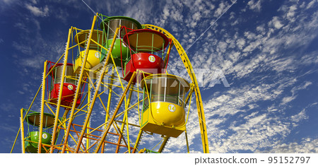 Attraction (carousel) ferris wheel on the background of the cloudy sky 95152797