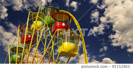 Attraction (carousel) ferris wheel against the background of a romantic evening sky Attraction (carousel) ferris wheel against the background of a romantic evening sky 95152803