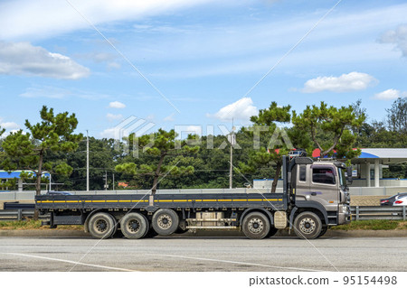 A truck stopped at a highway rest area A truck stopped at a highway rest area 95154498