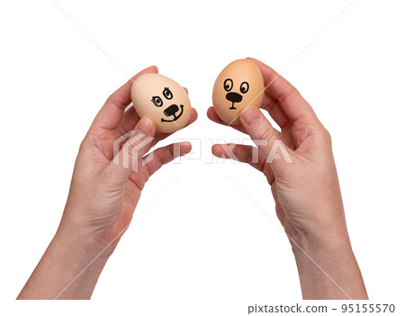 Hand Holding Raw Chicken Egg Isolated on White Background 95155570