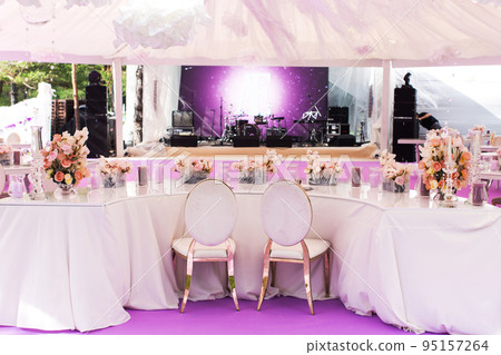 Table set for wedding or another catered event dinner and large white dome Table set for wedding or another catered event dinner and large white dome 95157264