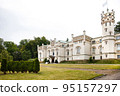Exterior of a beautiful old house with green lawn 95157297