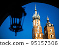 Church of St. Mary in the main Market Square on the background of dramatic sky 95157306