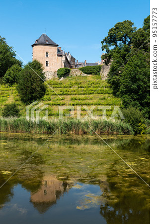 Lennik, Flemish Brabant Region, Belgium - The Gaasbeek medieval castle reflecting in a water pond 95157773