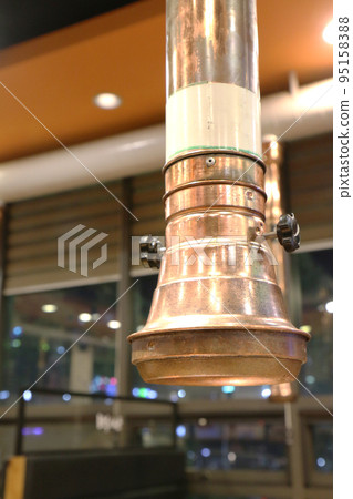 Exhaust duct above the table in a yakiniku restaurant (Korea) 95158388