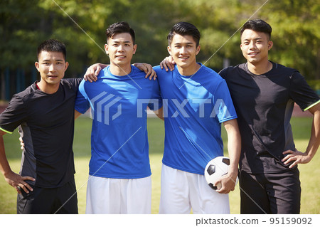 outdoor portrait of a team of young asian soccer football players outdoor portrait of a team of young asian soccer football players 95159092