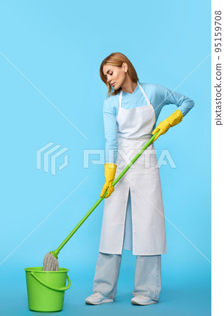 woman in rubber gloves washing floor with mop woman in rubber gloves washing floor with mop 95159708