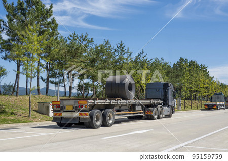 A truck stopped at a highway rest area A truck stopped at a highway rest area 95159759