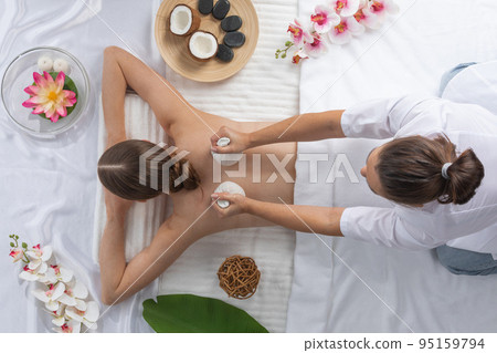 Woman at spa thai massage Woman at spa thai massage 95159794