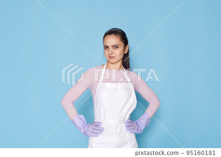 pretty woman in rubber gloves and cleaner apron pretty woman in rubber gloves and cleaner apron 95160181
