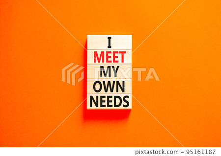 I meet my own needs symbol. Concept words I meet my own needs on wooden blocks. Beautiful orange table orange background. Business and i meet my own needs concept. Copy space. 95161187