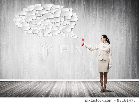 Woman with red phone and empty speech bubble 95161473