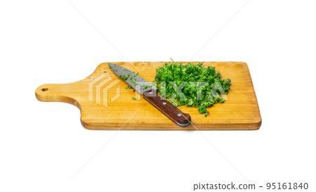 Fresh Green Chopped Parsleyon Wooden Cutting Board Background Isolated Fresh Green Chopped Parsleyon Wooden Cutting Board Background Isolated 95161840