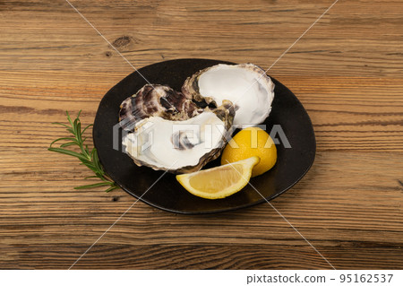 Empty Oyster Shell on Wood Table, Eaten Mollusc 95162537