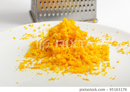 Raw Orange Peel Pile Isolated, Zest on White Background 95163176