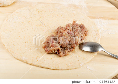 Making Meat Stuffed Closed Pie Isolated Making Meat Stuffed Closed Pie Isolated 95163382