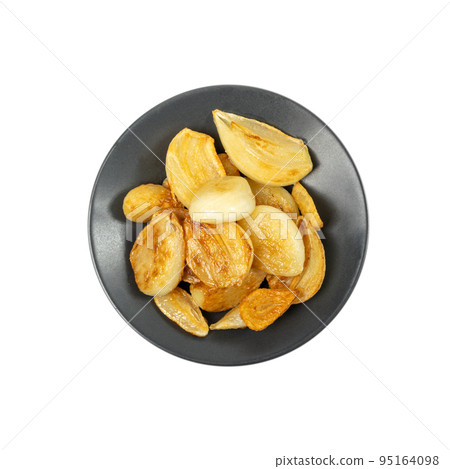 Fried Garlic Cloves Pile Isolated on White Background Fried Garlic Cloves Pile Isolated on White Background 95164098