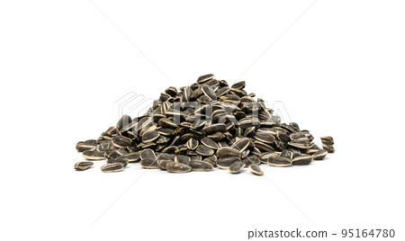 Sunflower Seeds Pile, Striped Raw Seeds Isolated Top View Sunflower Seeds Pile, Striped Raw Seeds Isolated Top View 95164780