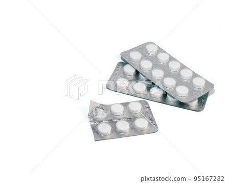 Pills on a white background. Various medicines in packages. Pills on a white background. Various medicines in packages. 95167282
