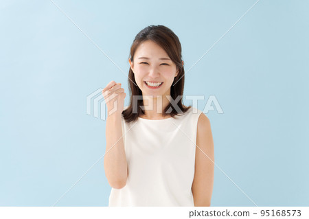 A woman doing a guts pose A woman doing a guts pose 95168573