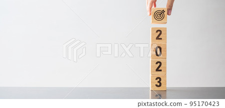 2023 block with dartboard sign. Business Goal, Target, Resolution, strategy, plan, Action motivation, mission, thinking, and New Year start concepts 2023 block with dartboard sign. Business Goal, Target, Resolution, strategy, plan, Action motivation, mission, thinking, and New Year start concepts 95170423