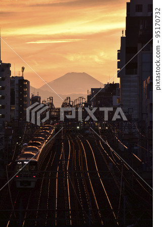 Evening view of train and Mt.Fuji Evening view of train and Mt.Fuji 95170732