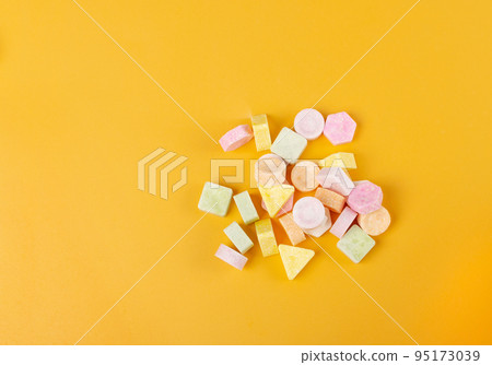 Tablet Candies on Pink Background, Compressed Tablets Tablet Candies on Pink Background, Compressed Tablets 95173039