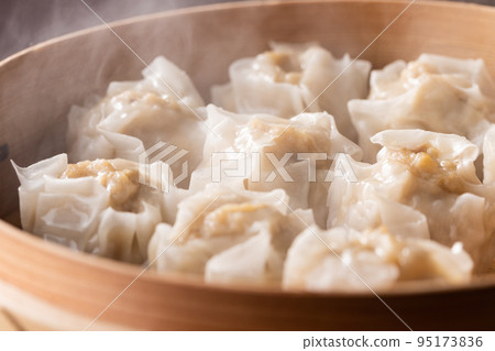 Fluffy shumai steamed in bamboo steamer with gentle steam 95173836