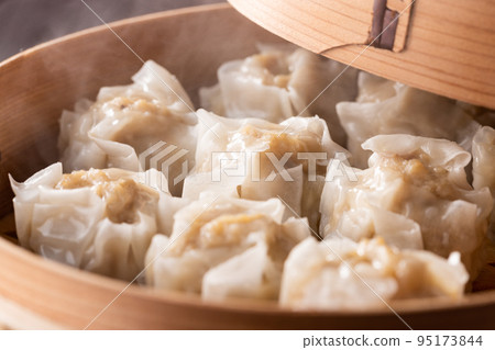 Fluffy shumai steamed in bamboo steamer with gentle steam 95173844