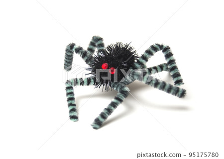 Closeup of decorative spider for Halloween decoration on white background Closeup of decorative spider for Halloween decoration on white background 95175780