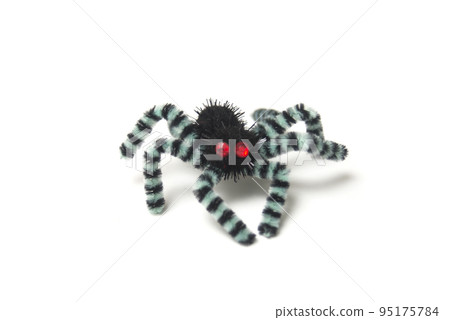 Closeup of decorative spider for Halloween decoration on white background 95175784