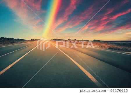 Highway road aerial view between natural parkland with dramatic sky Highway road aerial view between natural parkland with dramatic sky 95176615