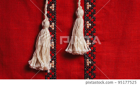 Handmade embroidery on Ukrainian shirt. Geometric ornaments, ancient traditional authentic clothes 95177525