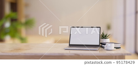 Close-up, Luxury bright workspace with laptop mockup and copy space on white marble tabletop Close-up, Luxury bright workspace with laptop mockup and copy space on white marble tabletop 95178429