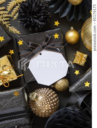 Black and golden Christmas Gift Boxes and ornaments, square gift tag Mockup 95179175