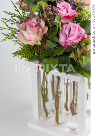 Rose flower bouquet on white background close up 95179470