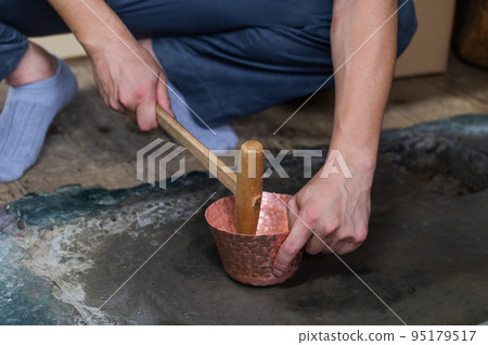 Craftsmen's handiwork Traditional copperware production 95179517