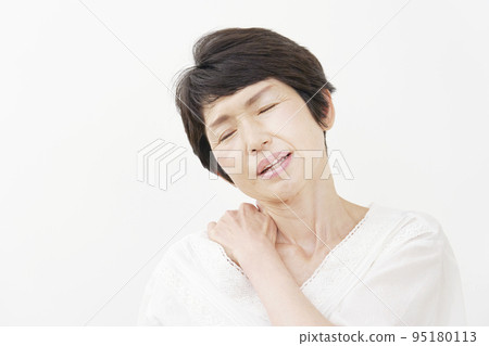 Middle-aged woman with stiff shoulders White background Middle-aged woman with stiff shoulders White background 95180113